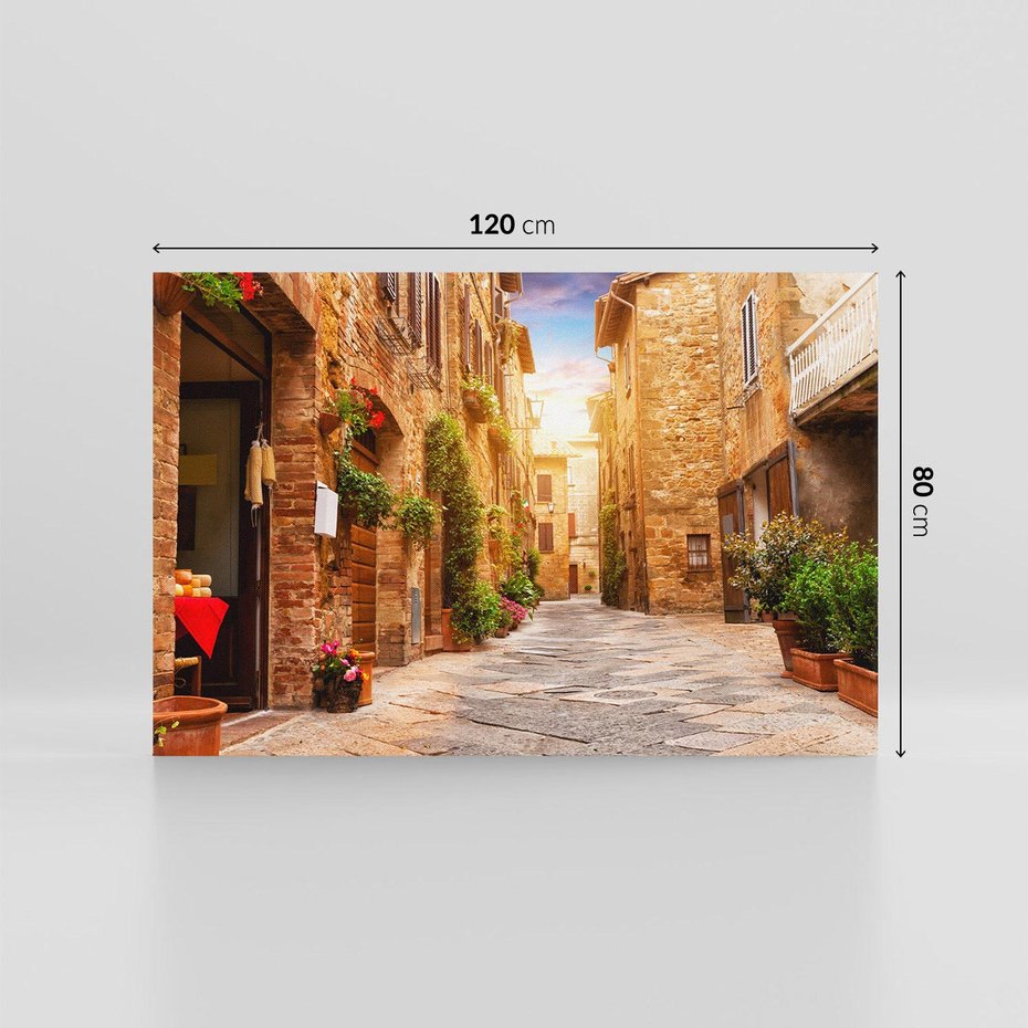 Obraz na płótnie 120x80 - Urok uliczki miejskiej z kwiatami - sklep, uliczka