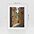 Plakat w ramie 30x40 - Włoska uliczka w perspektywie - Włochy, uliczka - rama biała