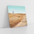 Obraz na płótnie 40x40 - Tajemnicza Ścieżka - latarnia morska w oddali, suche trawy