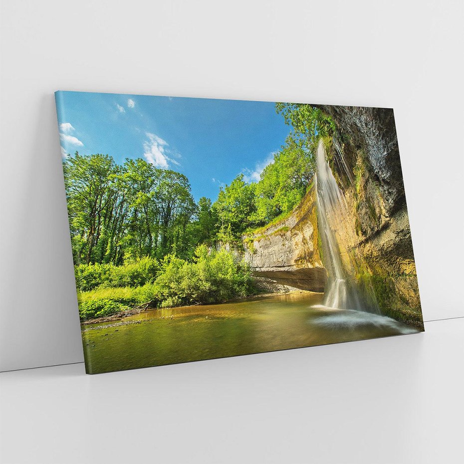 Obraz na płótnie 70x50 - Wodospad: Skały w ruchu - wodospad, las