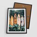 Plakat w ramie 50x70 - Surfowanie w Harmonii z Naturą - deski surfingowe, oparte o rośliny - rama czarna