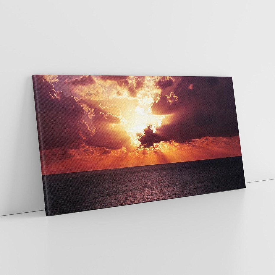 Obraz na płótnie 140x70 - Słońce i chmury nad morzem - słońce, chmury