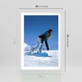 Plakat w ramie 50x70 - Snowboard na zimowych zboczach - snowboard, zima - rama biała