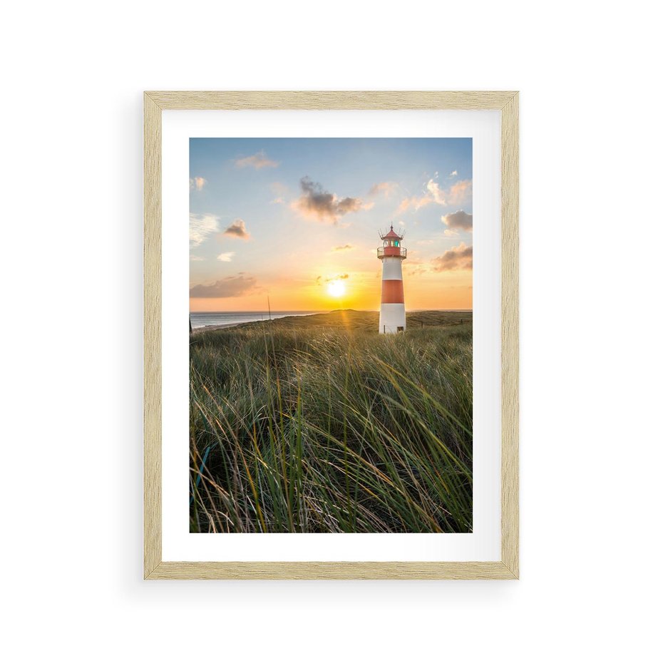 Plakat w ramie 30x40 - Magia latarni przy zachodzie - latarnia, zachód - rama drewno