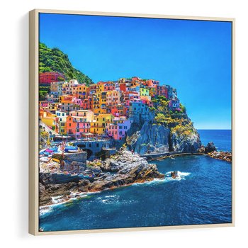 Obraz w ramie 80x80 - Barwne Wybrzeże - nadmorskie miasto na klifie, kolorowe tęczowe budynki - rama drewno