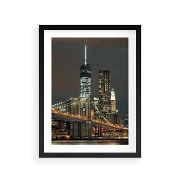 Plakat w ramie 50x70 - Miasto rozświetlone nocnym blaskiem - miasto, nocą - rama czarna