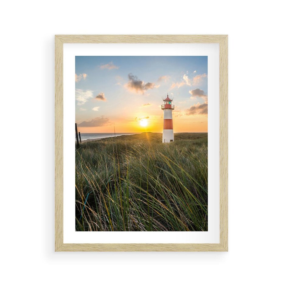 Plakat w ramie 40x50 - Magia latarni przy zachodzie - latarnia, zachód - rama drewno