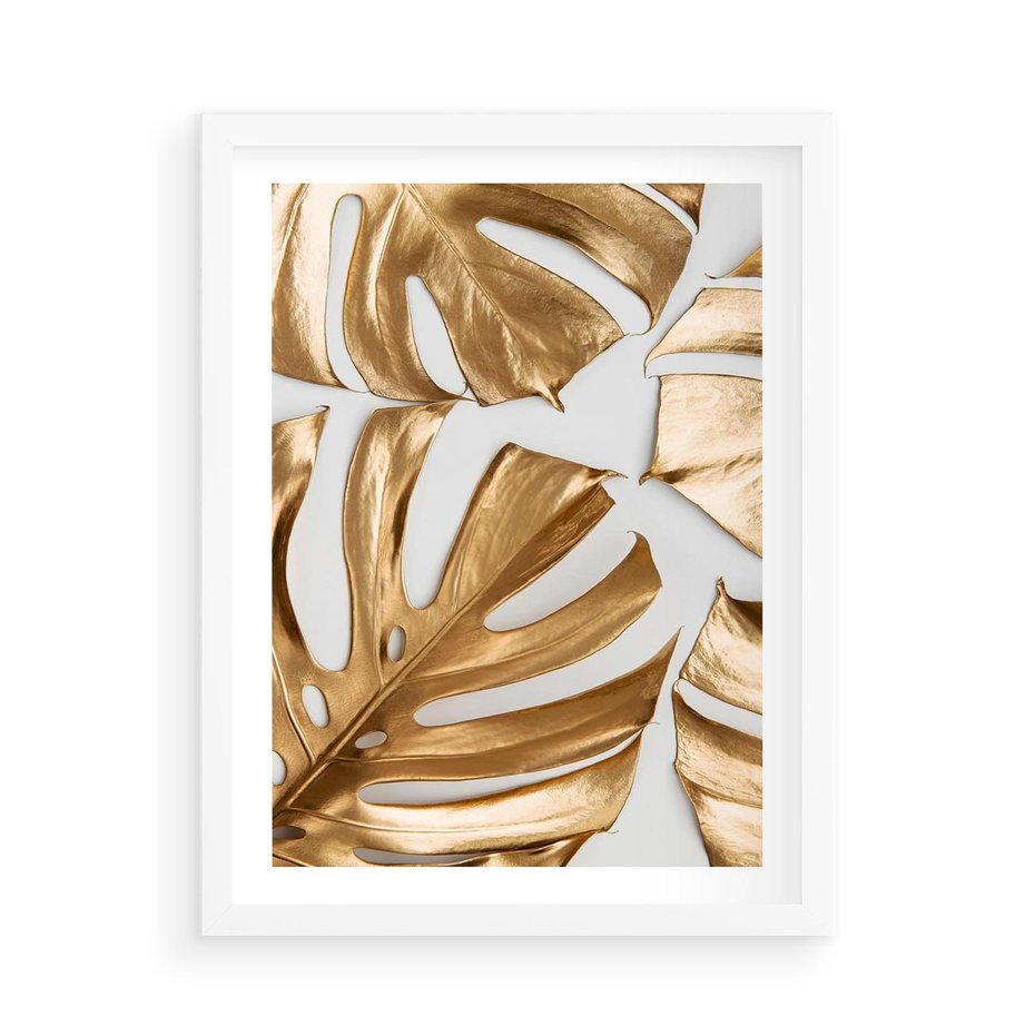 Plakat w ramie 50x70 - Złote Akcenty w Fotografii - złotel liście monstery, na białym tle - rama biała