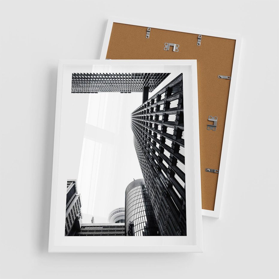 Plakat w ramie 50x70 - Monochromatyczna Sceneria Wieżowców - architektura, wieżowce - rama biała