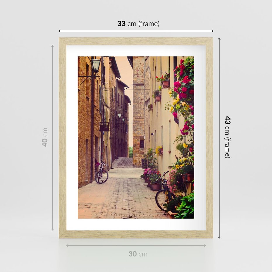 Plakat w ramie 30x40 - Rowerowa przygoda w uliczkach pełnych perspektywy - uliczka, perspektywa - rama drewno