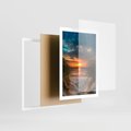 Plakat w ramie 50x70 - Magia zachodu słońca na plaży - zachód, słońca - rama biała