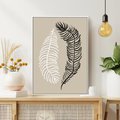 Obraz w ramie 70x100 - Spleciona Harmonia - sztuka nowoczesna, białe i czarne pióro - rama biała