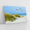 Obraz na płótnie 100x70 - Mewy nad morską plażą - mewy, plaża