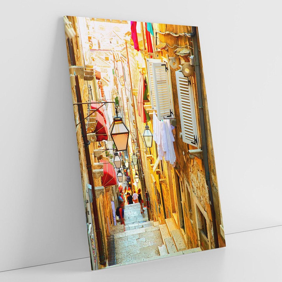 Obraz na płótnie 70x100 - Odkryj tajemnice miasta - uliczka, perspektywa