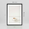 Plakat w ramie 50x70 - Kawa w Prostocie - kawa w filizance, białe tłó - rama czarna