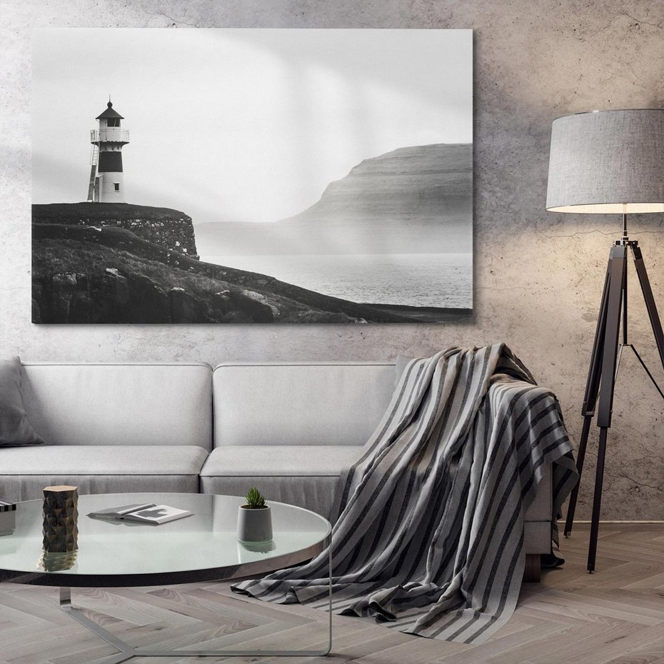 Obraz na płótnie 70x50 - Melancholia Północy - czarnobiała fotografia, nadmorska latarnia na klifie