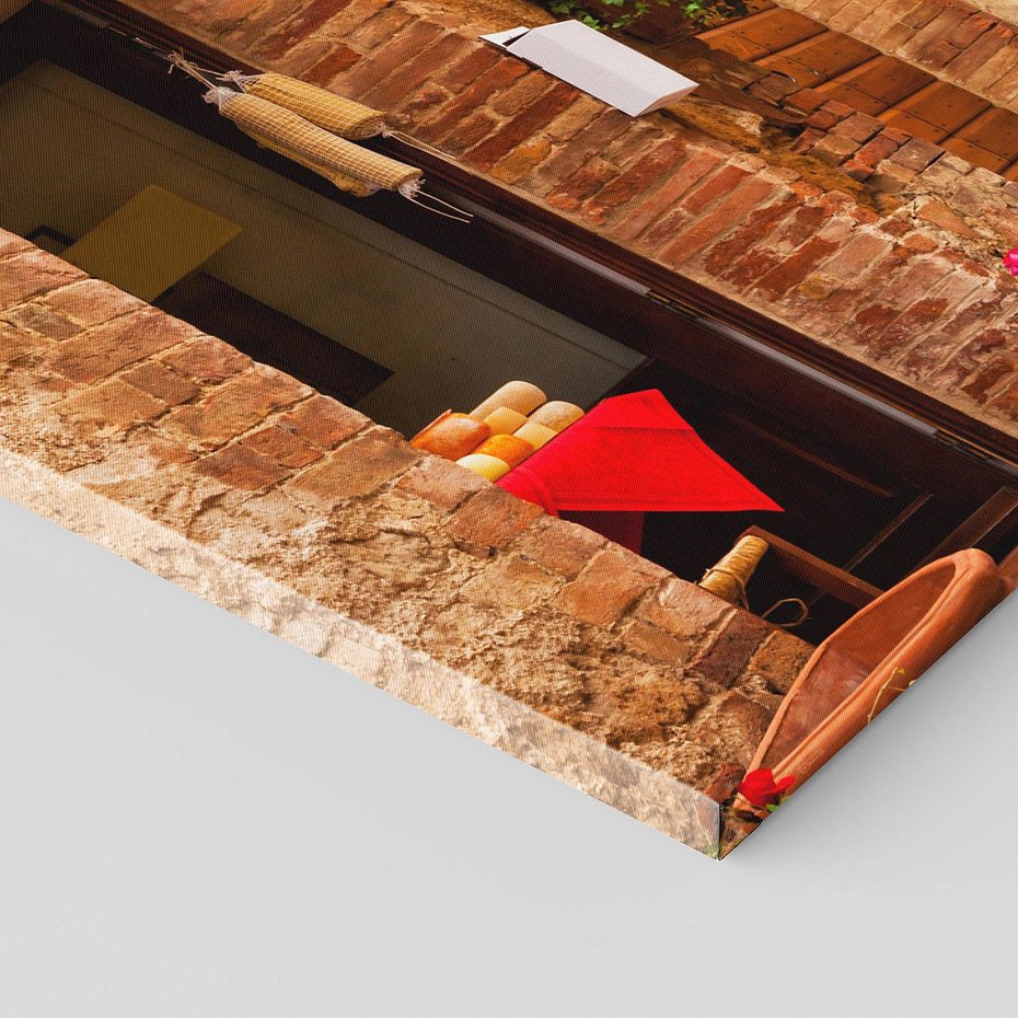 Obraz na płótnie 120x60 - Urok uliczki miejskiej z kwiatami - sklep, uliczka