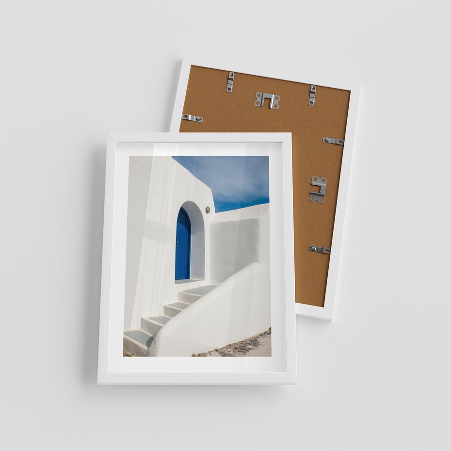 Plakat w ramie 30x40 - Powitanie Wyspy - Santorini, drzwi - rama biała