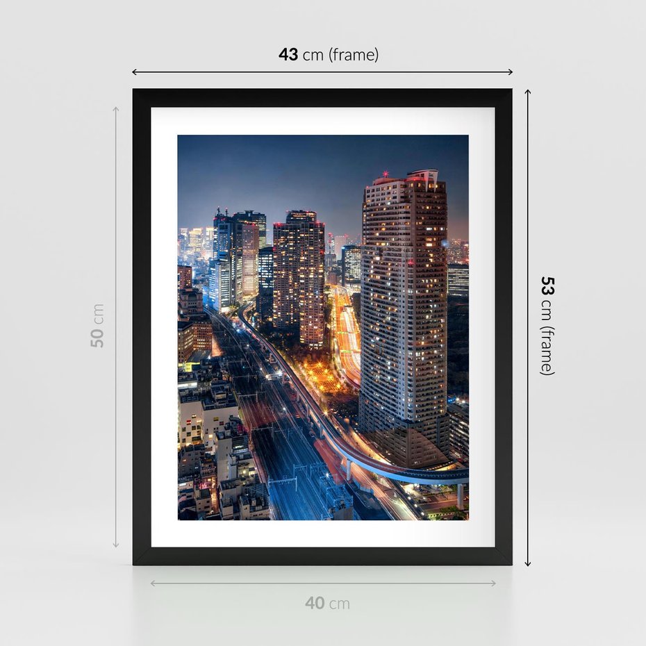 Plakat w ramie 40x50 - Miasto nocą z wieżowcami w tle - miasto, nocą - rama czarna