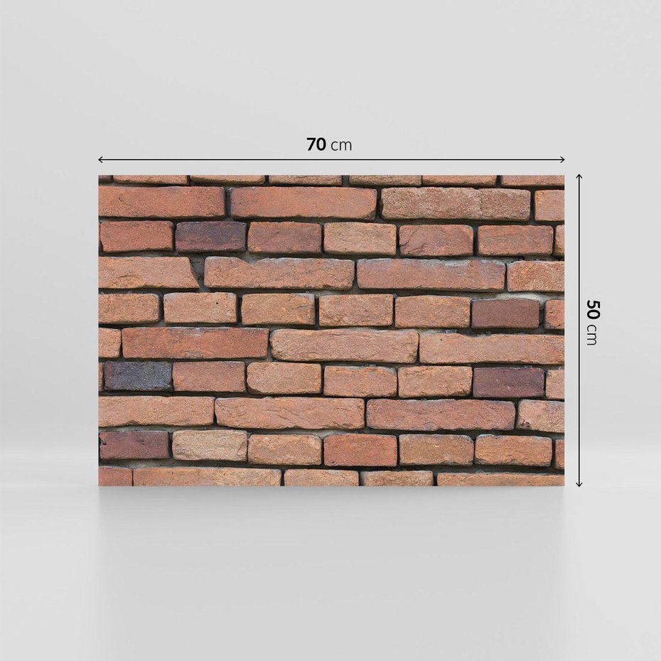 Obraz na płótnie 70x50 - Mur cegieł: industrialny urok - cegły, mur