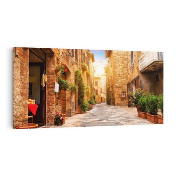 Obraz na płótnie 120x60 - Urok uliczki miejskiej z kwiatami - sklep, uliczka