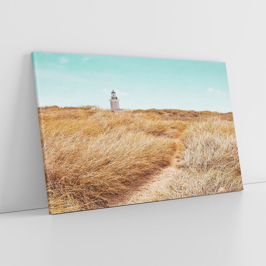 Obraz na płótnie 120x80 - Tajemnicza Ścieżka - latarnia morska w oddali, suche trawy