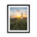 Plakat w ramie 40x50 - Magia latarni przy zachodzie - latarnia, zachód - rama czarna