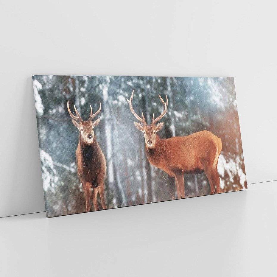 Obraz na płótnie 120x60 - Mroźne Spotkanie w Leśnej Krainie - dwa jelenie, zima