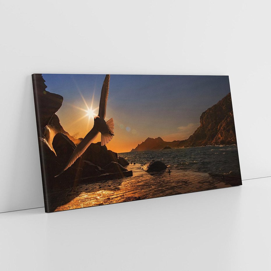 Obraz na płótnie 100x50 - Zachód słońca nad morzem z mewą - mewa, morze