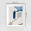 Plakat w ramie 40x50 - Powitanie Wyspy - Santorini, drzwi - rama biała