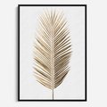 Obraz w ramie 70x100 - Złoty blask palmowego liścia - złota, palma - rama czarna