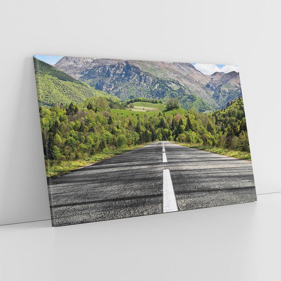 Obraz na płótnie 70x50 - Droga przez góry: podróż do przygody - droga, góry