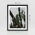 Plakat w ramie 40x50 - Boho oaza wśród kaktusów - kaktusy, pustynia - rama czarna