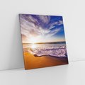 Obraz na płótnie 40x40 - Zachód słońca na plaży: Magia nad morzem - morze, plaża
