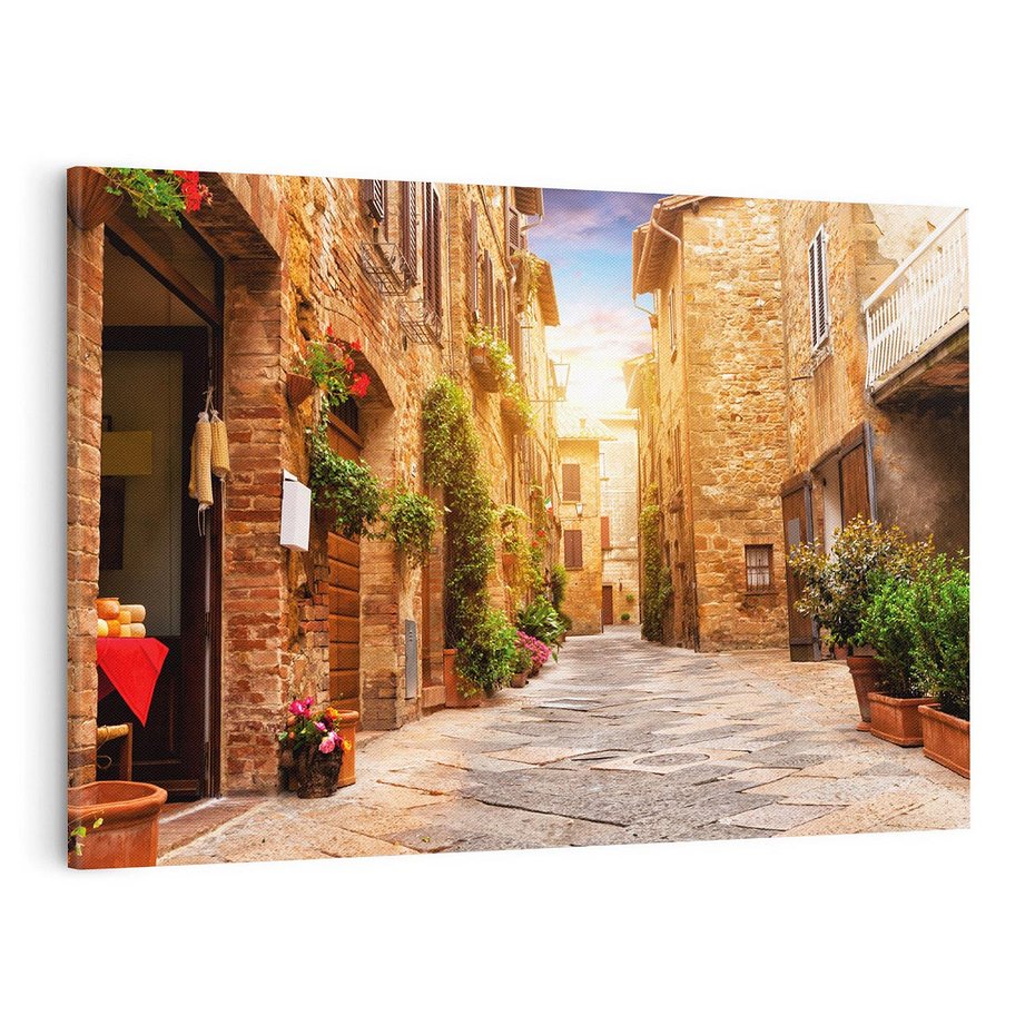 Obraz na płótnie 120x80 - Urok uliczki miejskiej z kwiatami - sklep, uliczka