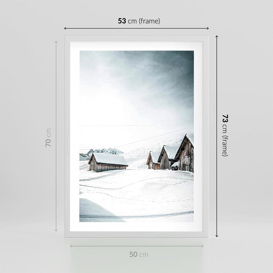 Plakat w ramie 50x70 - Zima w Domkach: Urok Śnieżnej Scenerii - domki w śnieżnym krajobrazie - rama biała