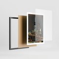 Plakat w ramie 50x70 - Miasto rozświetlone nocnym blaskiem - miasto, nocą - rama czarna