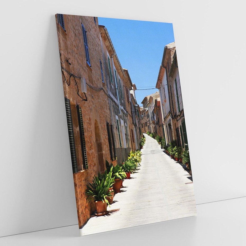Obraz na płótnie 50x70 - Urok uliczki: perspektywa miasta - uliczka, perspektywa