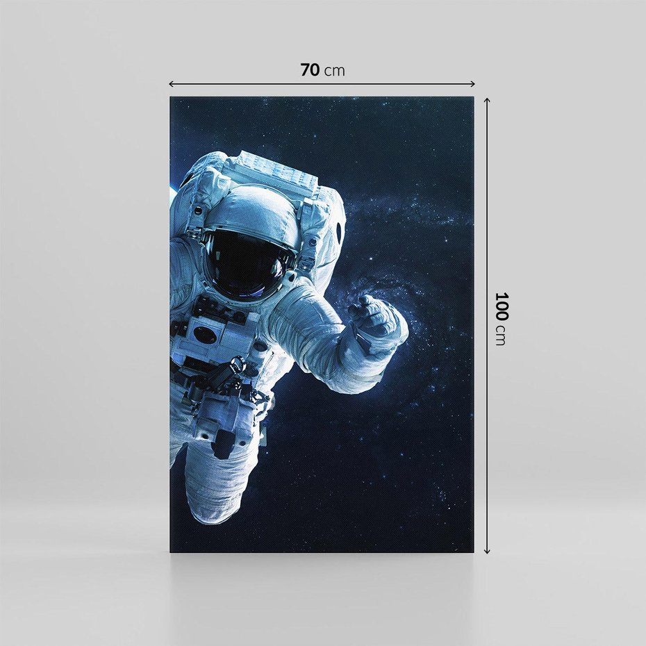 Obraz na płótnie 70x100 - kosmiczna podróż - kosmonauta, ziemia