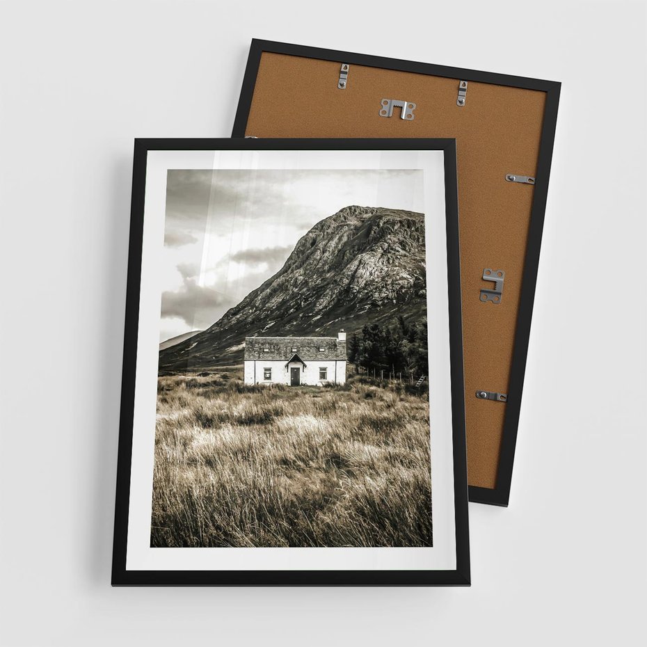 Plakat w ramie 50x70 - Biały Domek w Sepii: Wiejski Urok - domek w górach, kolory sepii - rama czarna
