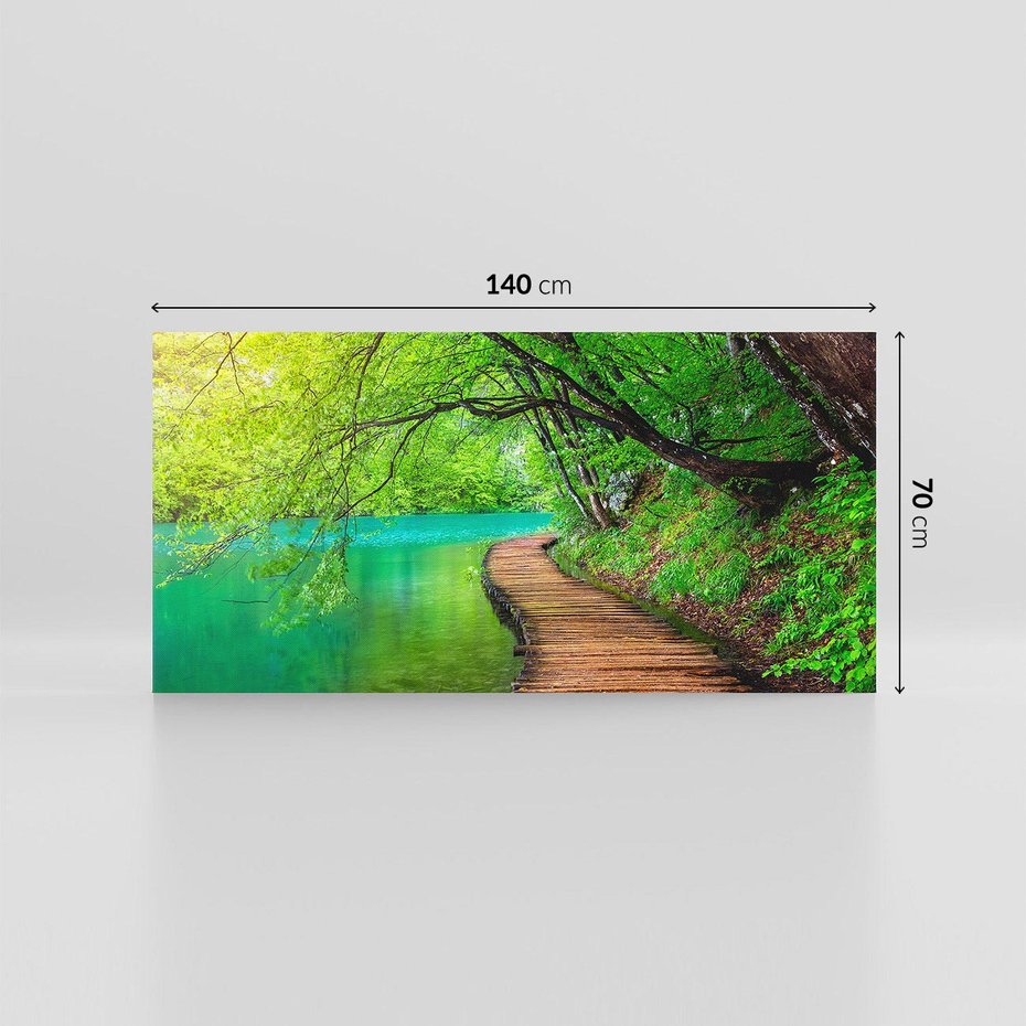 Obraz na płótnie 140x70 - Spokój nad jeziorem: Zatop się w naturze - jezioro, drzewa