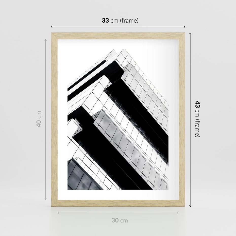 Plakat w ramie 30x40 - Nowoczesna Surowość: Wieżowiec na Czarno-Białej Grafice - architektura, wieżowiec - rama drewno