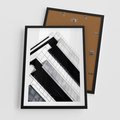 Plakat w ramie 50x70 - Nowoczesna Surowość: Wieżowiec na Czarno-Białej Grafice - architektura, wieżowiec - rama czarna
