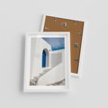 Plakat w ramie 30x40 - Powitanie Wyspy - Santorini, drzwi - rama biała