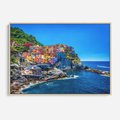 Obraz w ramie 120x80 - Barwne Wybrzeże - nadmorskie miasto na klifie, kolorowe tęczowe budynki - rama drewno