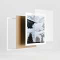 Plakat w ramie 40x50 - Zimowa Magia Gór: Śnieżne Szczyty - grajobraz górski, zima - rama biała