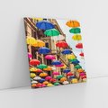 Obraz na płótnie 40x40 - Barwna symfonia wyobraźni - fotografia, kolorowe parasolki podwieszone nad ulicą