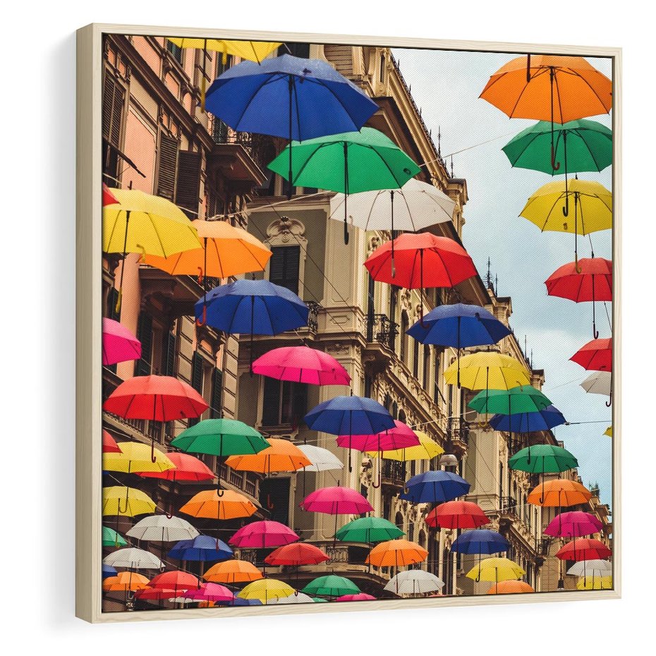 Obraz w ramie 50x50 - Barwna symfonia wyobraźni - fotografia, kolorowe parasolki podwieszone nad ulicą - rama drewno
