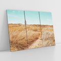 Obraz na płótnie 120x80 - Tajemnicza Ścieżka - latarnia morska w oddali, suche trawy