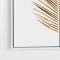 Obraz w ramie 80x120 - Złoty blask palmowego liścia - złota, palma - rama biała